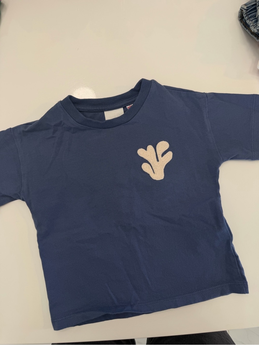 Zara Navy Short-Sleeve Tee with Cream Appliqué